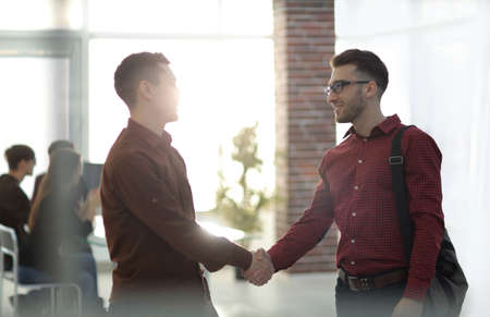 handshake colleagues in the office.の写真素材