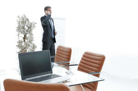 open laptop on the desktop, in the conference roomの写真素材