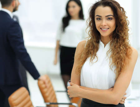 business woman on the background of business teamの写真素材