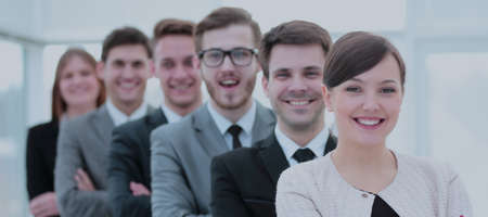 Executive woman showing a charming smile in front of the camera