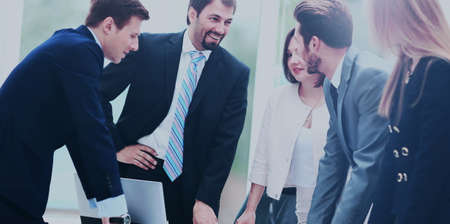 Business people working and discussing together at meeting in ofの写真素材