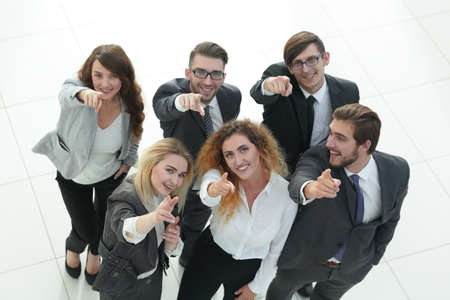 smiling business team showing thumbs upの写真素材