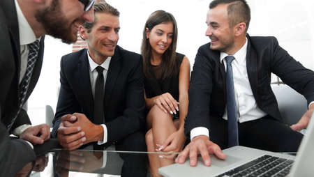 closeup.business team working on laptop.