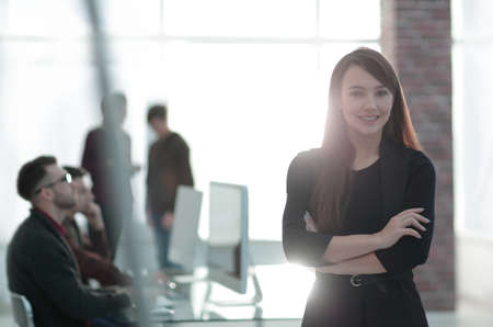 business woman on blurred background officeの写真素材