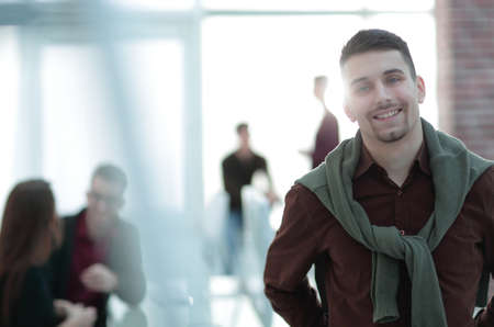 creative businessman on background of office