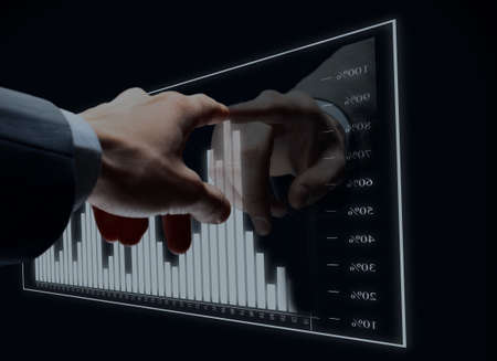 Businessman  hand touch virtual diagramの写真素材