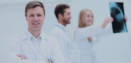 Healthcare, medical and radiology concept - doctors looking at xの写真素材