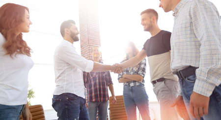 view from the top.handshake of businessmen