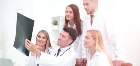 Portrait of confident happy group  doctors working at the medi