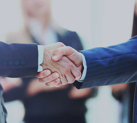 Business people shaking hands