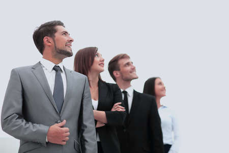 Smiling employees in a line at workの写真素材