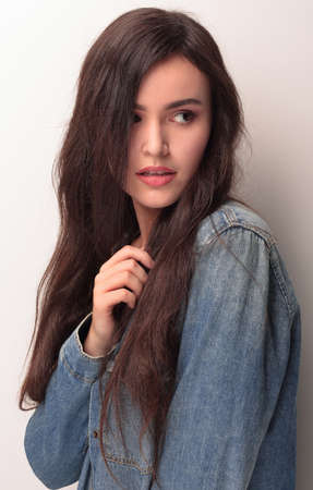 Portrait of beautiful young woman with black hairの写真素材