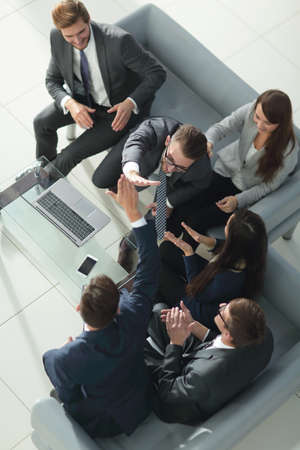 Team of male and female entrepreneurs celebration finishing work