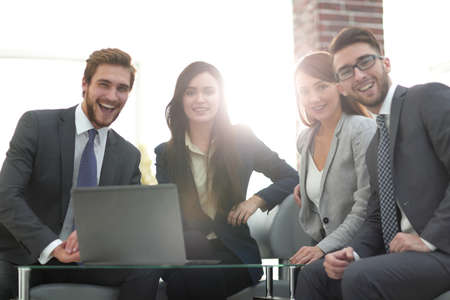 Business people are using a laptop during the conference in offiの写真素材