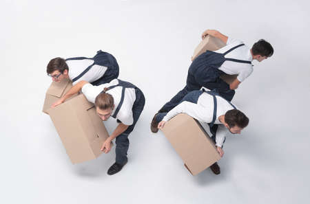 Responsible movers  in a hurry to do their job.の写真素材