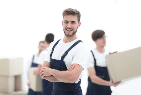 Photo workers holding boxes when moving flats,の写真素材