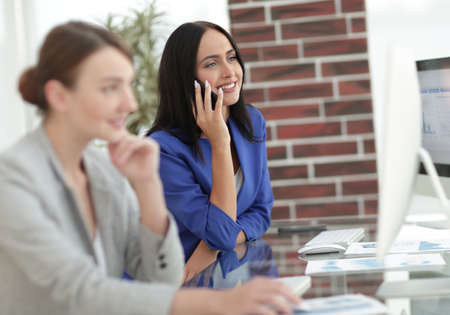 Women working together, office interior
