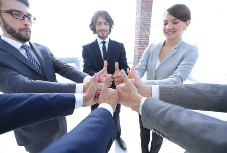 business team showing thumbs up.の写真素材