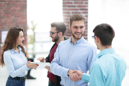 Group of business people who standing and discuss.