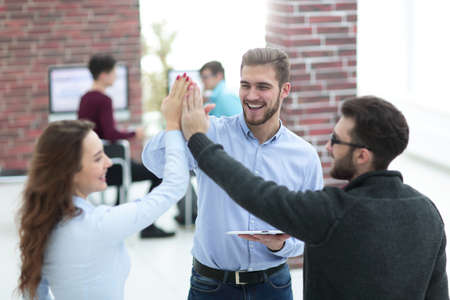 Business and office concept - smiling business team working withの写真素材