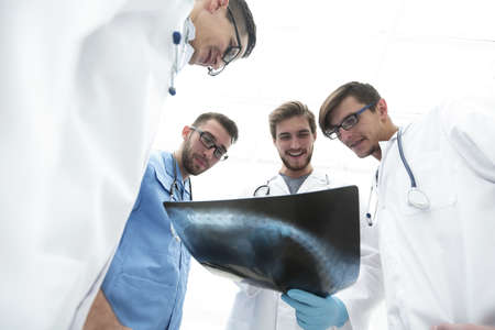 bottom view.team of doctors discussing an x-rayの写真素材