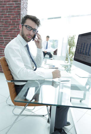 Manager communicates with the customer on the smartphoneの写真素材