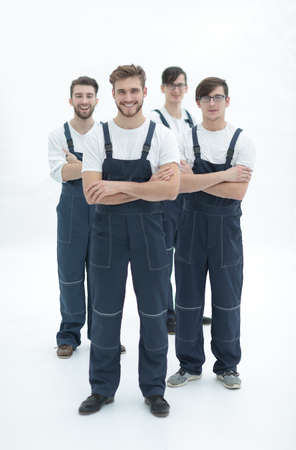 Happy team of responsible movers and their smiling leader.の写真素材