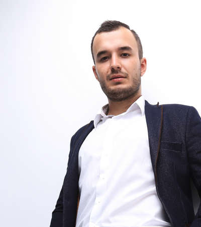 in full growth.bottom view of confident businessman .の写真素材