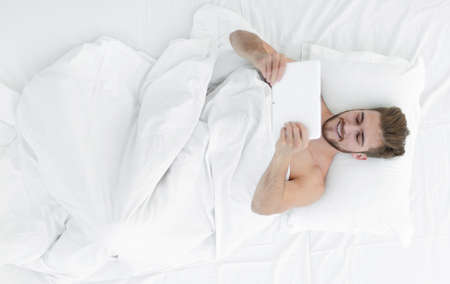 background image of a man with a digital tabletの写真素材