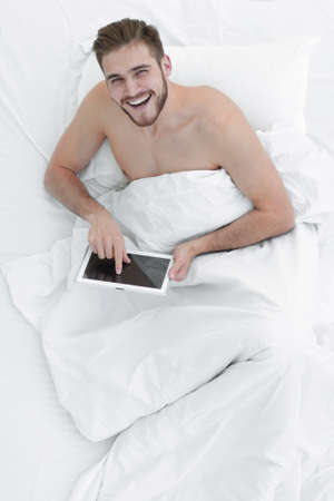 top view.young man using digital tabletの写真素材