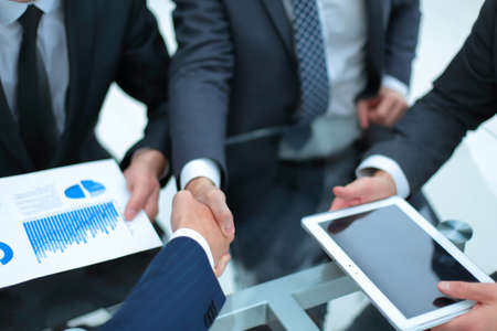 Business handshake. Business handshake and business people conce