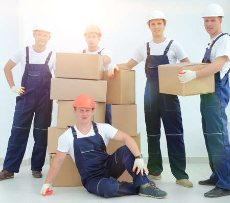 foreman and team builders with boxesの写真素材