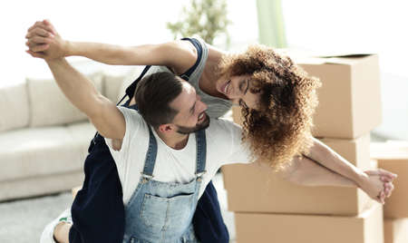 Happy married couple in a new house.の写真素材