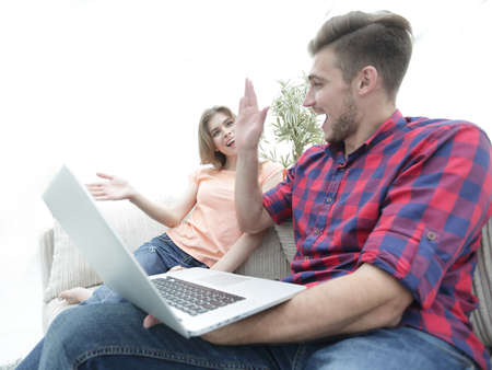 young man and his girlfriend giving each other a five in the sign of success