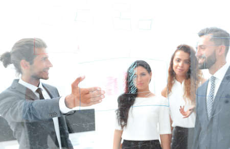 image in background. businessman and his business teamの写真素材