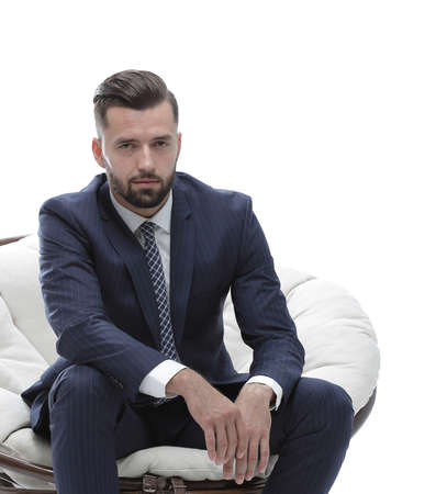 businessman sitting in a comfortable chairの写真素材