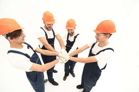 team of builders showing their solidarityの写真素材