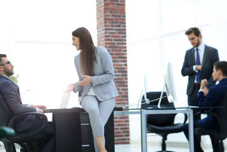 Business people discussing over new business project in office.の写真素材