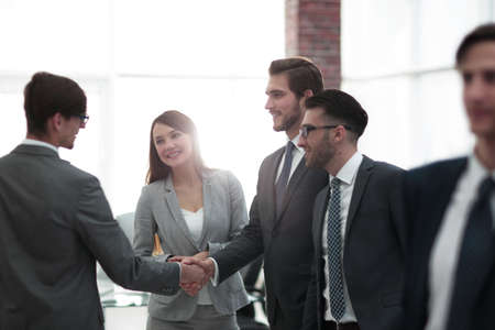 Business people shaking hands in the meeting roomの写真素材