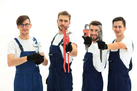 group of construction workers with working toolsの写真素材