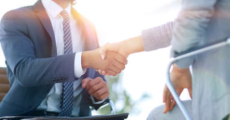 Successful job interview with boss and employee handshaking