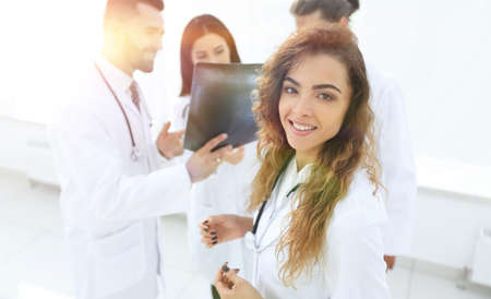 confident doctors in hospital looking at x-ray.の写真素材
