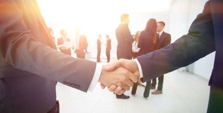 closeup of handshake of business partners on the background of bの写真素材