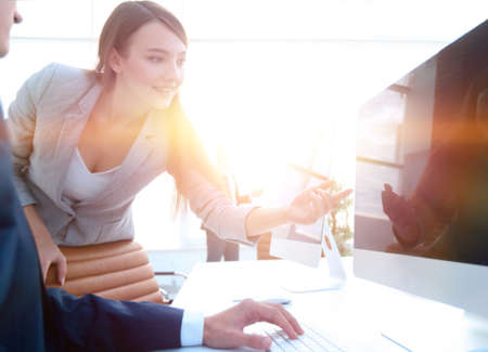 business woman pointing at the computer screen.の写真素材