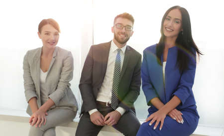 Smiling and confident business team having time breakの写真素材