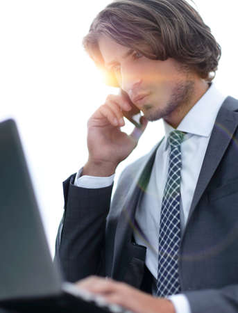 closeup.serious businesswoman talking on the smartphoneの写真素材