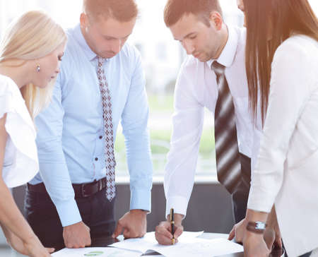 business team adjusts work planの写真素材