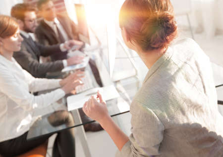 business woman conducts a workshop with the business teamの写真素材