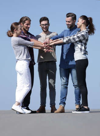 group of young people shows their unity.の写真素材