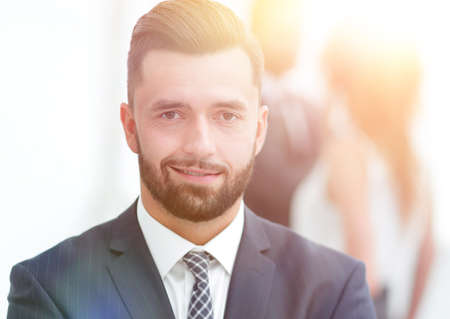 businessman on background of office.の写真素材
